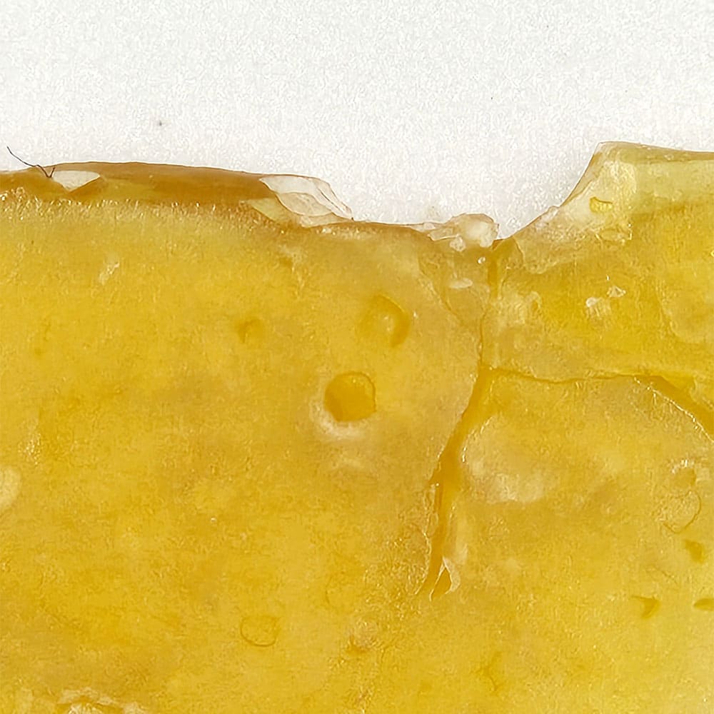 Club Canna Fire OG shatter strain from Chronic Store closeup